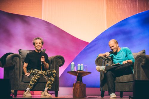 Tim Ferriss interviewing Brian Grazer onstage.