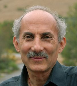 Jack Kornfield standing in nature.