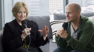 Brene Brown talking with Tim Ferriss on a couch.