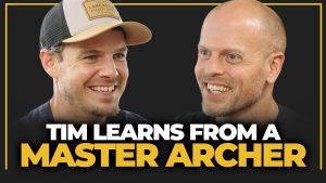 YouTube thumbnail of Jake Kaminski and Tim Ferriss, with the words "Tim learns from a master archer" at the bottom.